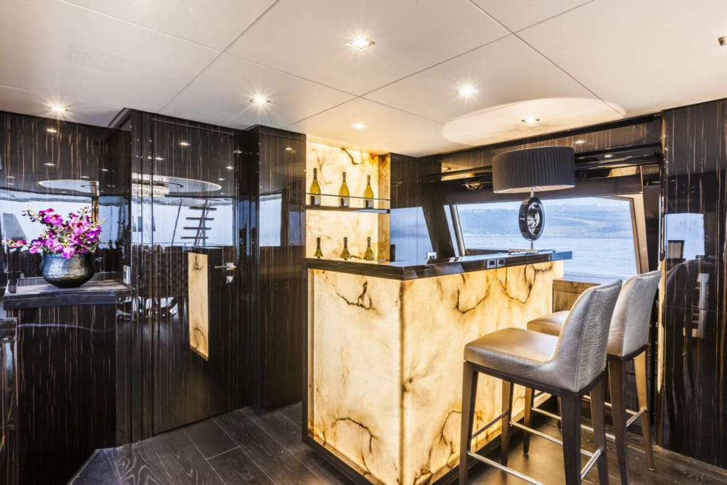 Illuminated bar on luxury super yacht Yvonne