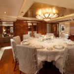 Benetti charter yacht Starfire interior formal dining